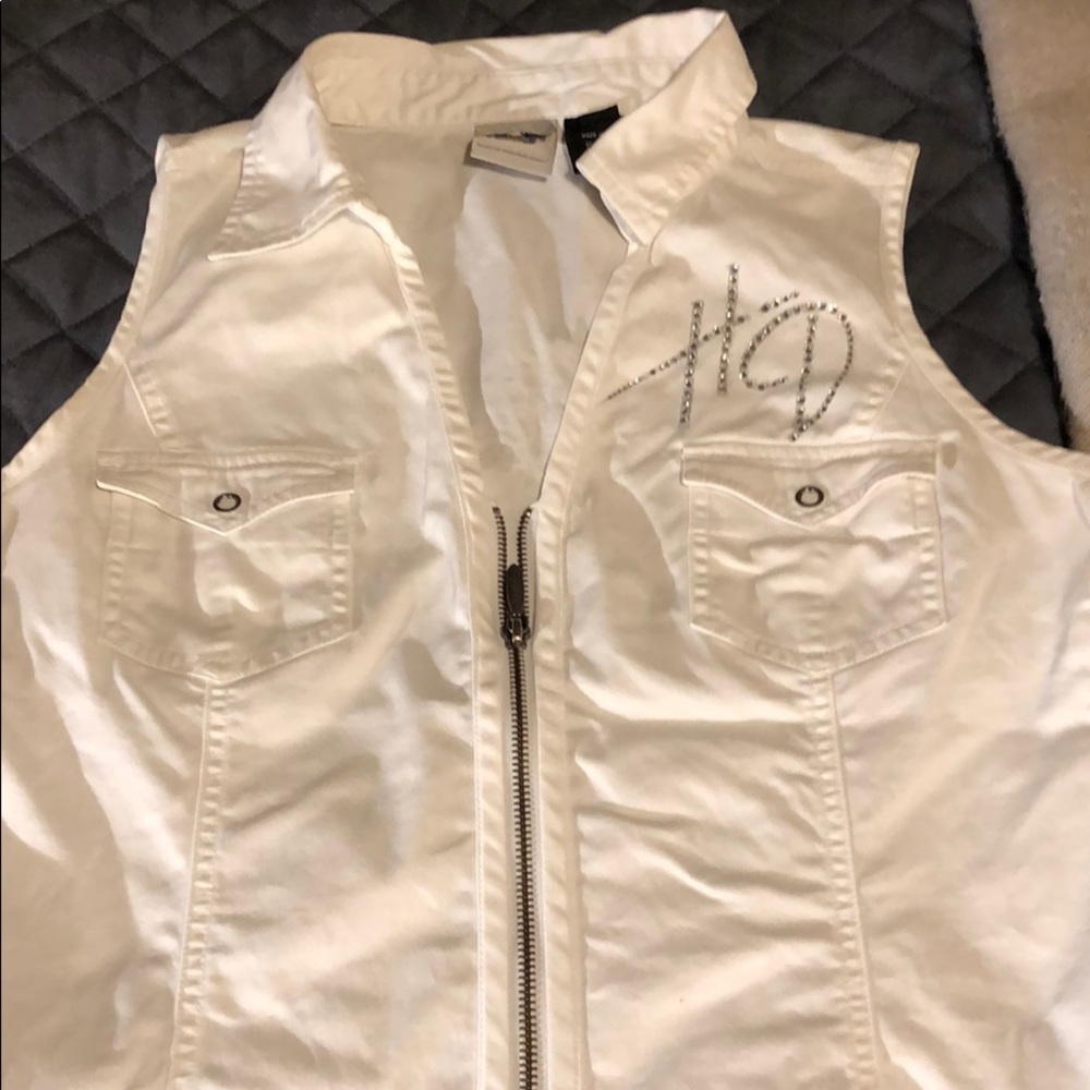 White zip front Harley Davidson top.